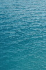 Calming blue ocean water surface background