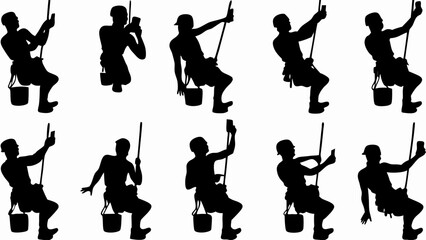 Obraz premium Silhouetted window washers suspended on ropes with buckets and squeegees in various positions