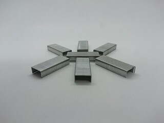 Close-up of a Staple Arrangement on a White Surface