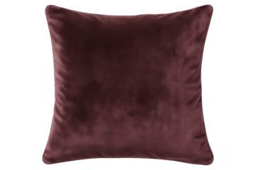 Plush dark red velvet cushion resting on transparent surface, enhancing luxurious home decor with sophisticated textile texture
