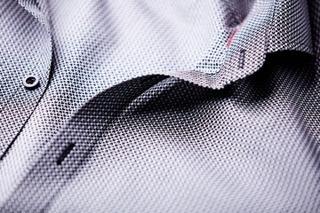 Close up of dark Men's shirt. Soft focus. Copy space.	
