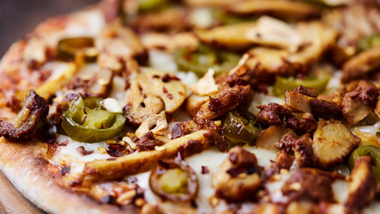Gyros Pizza with jalapeno pepper and mozzarella cheese. Soft focus. Close up.	
