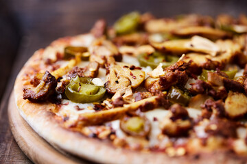 Gyros Pizza with jalapeno pepper and mozzarella cheese. Soft focus. Close up.