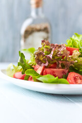 Healthy and tasty salad with feta cheese, various tomatoes, olives, cucumber, onion and lettuce....