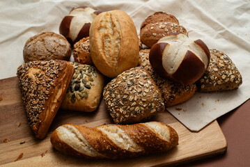 Various types of crusty German breads and flaky pastries