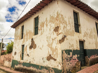 An old abandoned house in a street corner, in the town of Sotaquira in the eastern Andean mountains of central Colombia.