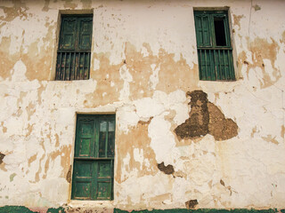 The weathered facade of an ancient abandoned house, in the town of Sotaquira in the eastern Andean mountains of central Colombia.