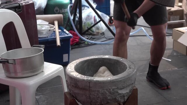 Traditional Japanese Sweet Mochi Making with an Old-Style Mochi Pounding Machine.