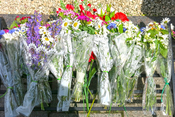 bouquets of flowers on the grave of poet A.S. Pushkin