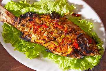 Grilled fish with spicy seasoning