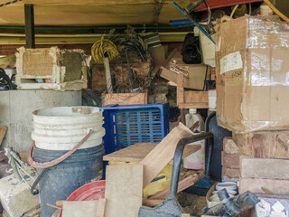 The very messy basement of a farmhouse, in the eastern Andean mountains of central Colombia, near the Iguaque natural reserve.