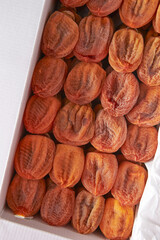 Dried persimmons in a box
