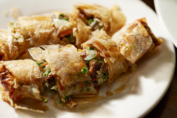 Spring rolls fried on a plate