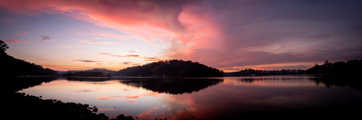 Scenic view of Georges River under Como Bridge during sunset
