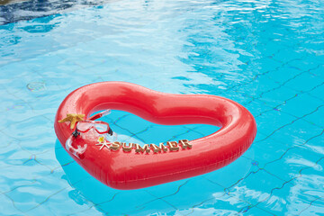 heart shaped float ,snorkeling, and summer items at the resort pool