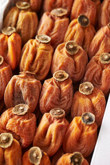 Dried persimmons in a box