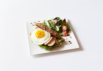 Sandwich with salad on a plate