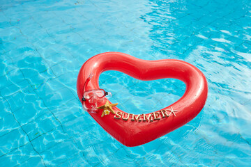 heart shaped float ,snorkeling, and summer items at the resort pool
