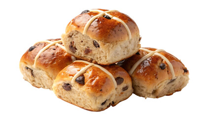 A pile of freshly baked sweet hot cross buns with dried fruit and a white cross on top against a black background