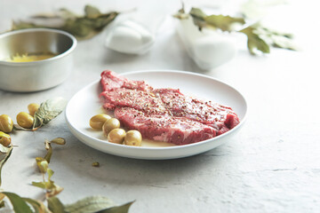 Raw meat with garlic and spices, seasoning