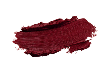 Striking lipstick swipe background displays a rich burgundy hue on black