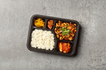 Various side dishes and stir-fried octopus lunch box