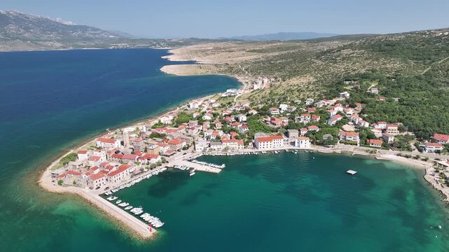 Aerial view of Vinjerac village on Novigrad Sea with harbor and church