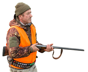 Hunter man in camouflage with a gun during the hunt in search of wild birds or game. Autumn hunting...