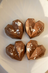 Heart-shaped chocolate with splatter