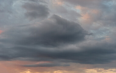 Russia. The South of Western Siberia. Panorama of the evening summer sky with multicolored clouds over the fields of Kuznetsk Alatau.