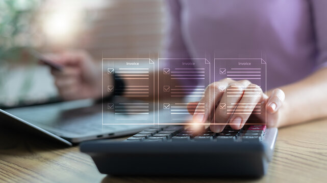 Close-up of a hand using a calculator with floating invoice icons, showing digital billing, online invoice management, accounting tasks, and finance operations.