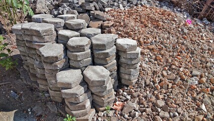 Stacks of hexagonal paving blocks around the construction site
