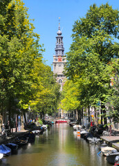 Groenburgwal canal during a summer season in the city center of Amsterdam, Netherlands 