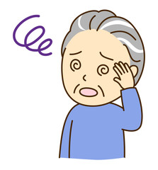 めまいで目が回っているシニア男性