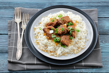 beef slow cooked with gravy served over rice