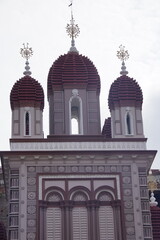 The exterior of a building featuring the religious architecture