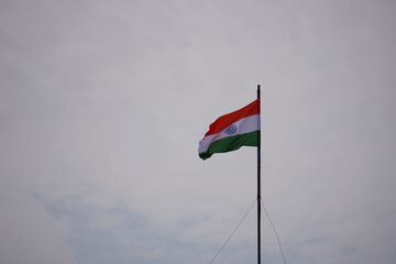 The Indian National Flag is swaying against the mild breeze 