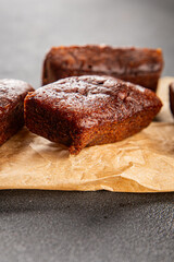 Financier biscuit chocolate cookie sweet dessert fresh delicious gourmet food background on the table rustic food top view copy space