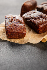 Financier biscuit chocolate cookie sweet dessert fresh delicious gourmet food background on the table rustic food top view copy space