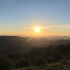 Golden sunrise over rolling hills and misty valleys