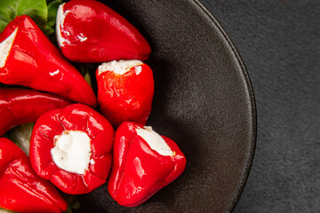 Hot peppers cheese filling pickled vegetables appetizer fresh delicious gourmet food vegetarian...