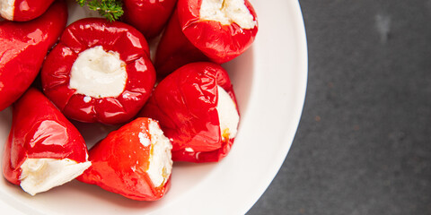 Hot peppers cheese filling pickled vegetables appetizer fresh delicious gourmet food vegetarian...