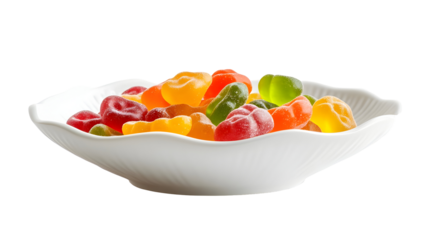 Assorted gummy candies in white bowl on white background