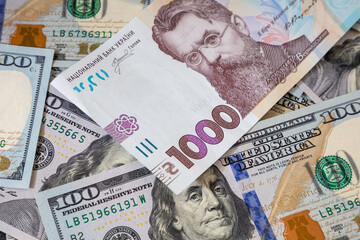 Background with Ukrainian money and American dollars