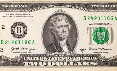 Banknote 2 dollars of the United States. Paper money of the USA. Fragment of the dollar