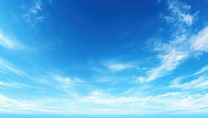 Fototapeta premium Clear Blue Sky with Wispy Clouds - Perfect for Nature and Landscape Projects