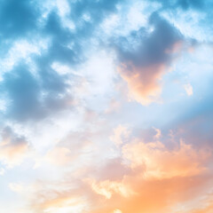 Obraz premium Pastel colored clouds in the sky at sunrise or sunset.