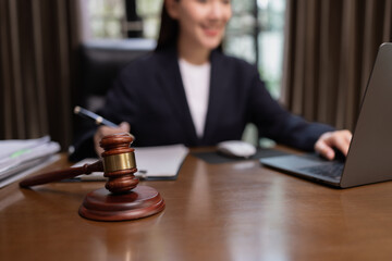 Lawyer Businesswoman Working with Documents and Signing Contract at Office Desk, Hammer on Wood table, Judge's Gavel, Law, Justice Symbol,
