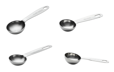 Elegant array of stainless steel measuring spoons on stark white backdrop