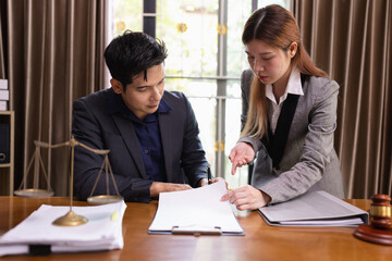Two Lawyer with Document Paper and Hammer on Wood table,  Judge's Gavel, Law, Justice Symbol,...
